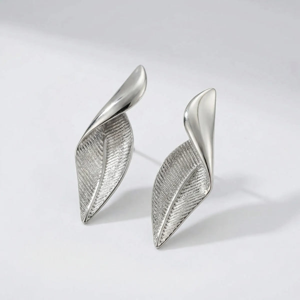 Knotara - Glossy Gold-Tone Knot Stud Earrings Silver 9